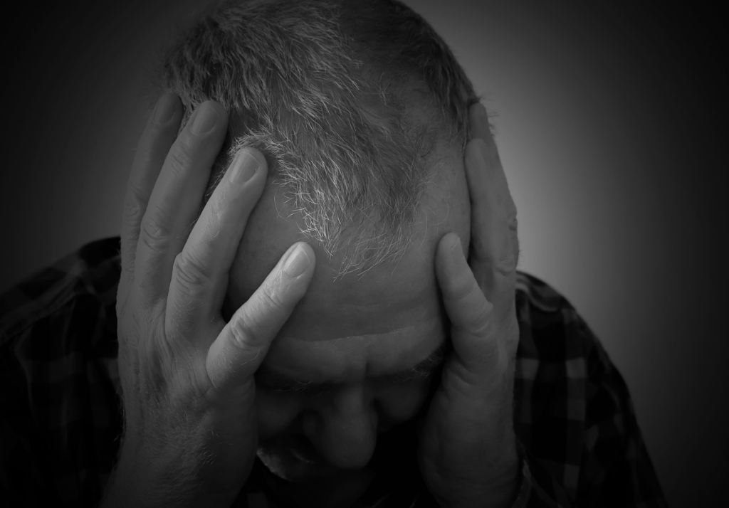 man-headinhands.webp